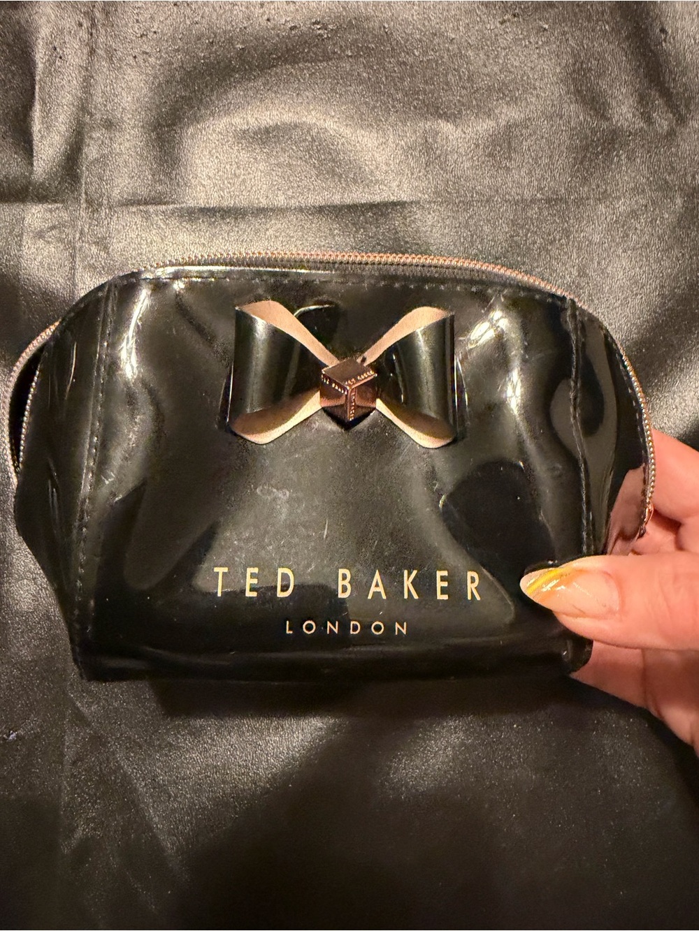 Ted Baker Black Patent Bow Cosmetic Pouch with Gold Logo